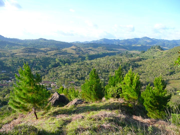 Similar images of green hills and blue skies from Nicaragua and Scotland.