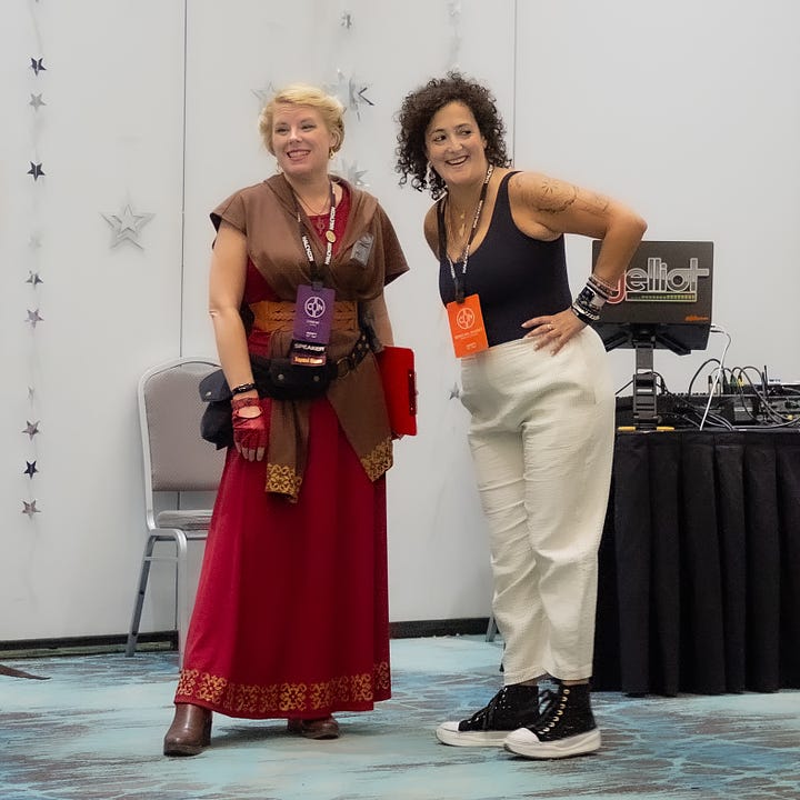 Left: Cass with three congoers, smiling at the camera | Right: Cass with keynote speaker Mikhael Tara Garver