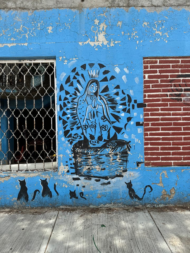 Four images of black and white street art in Oaxaca.