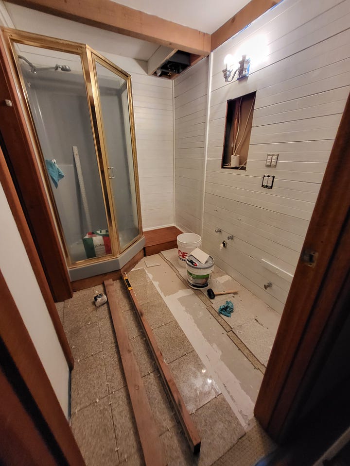 Before, during and after photos of the bathroom redo.