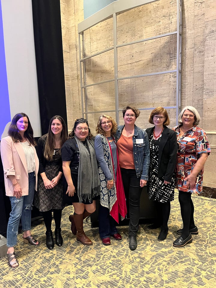 Two photos depicting the seven women panelists and organizers, and a view of the seated audience from behind with a screen projecting the event title and names of participants