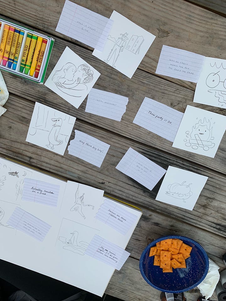 Kayla Stark and Vivien Mildenberger play a drawing and writing game to help with ideation for stories, character and art
