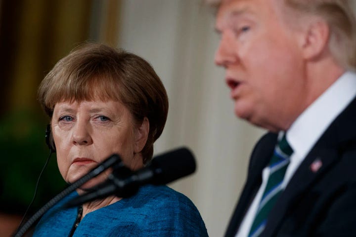 Angela Merkel listens as President Donald Trump speaks during their joint news conference in the East Room of the White House in Washington, on Friday, March 17, 2017. Photo: Evan Vucci/AP.