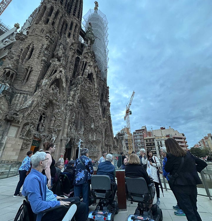 People in front of Sagrada Familia Church in Barcelona.