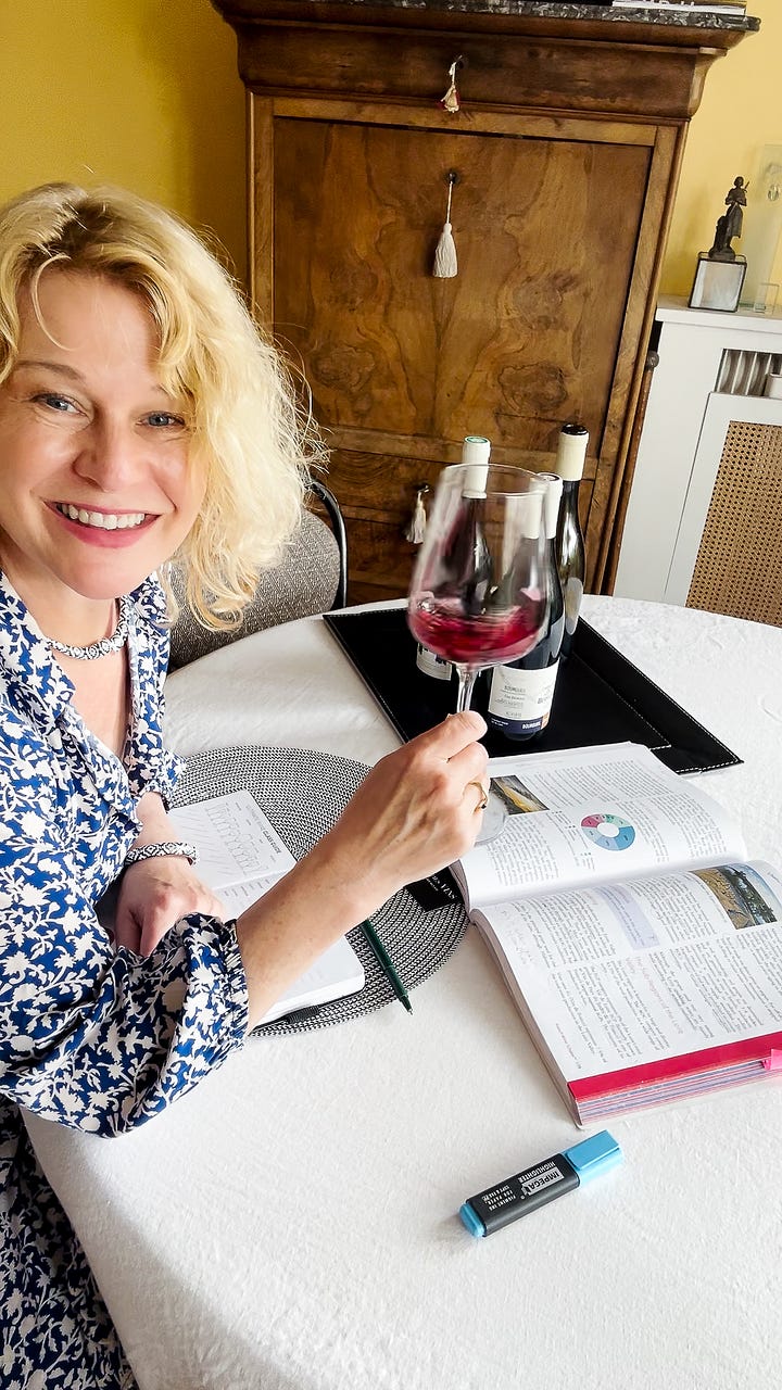 Karen Bussen tastes wine and studies for a wine exam