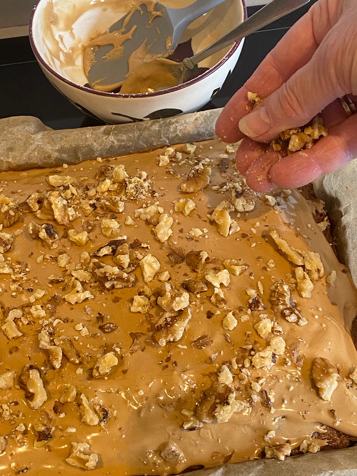 Coffee Cake with Coffee Frosting and Crushed Walnuts.