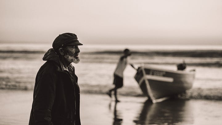Two different perspectives of fishermen providing for their families in black and white
