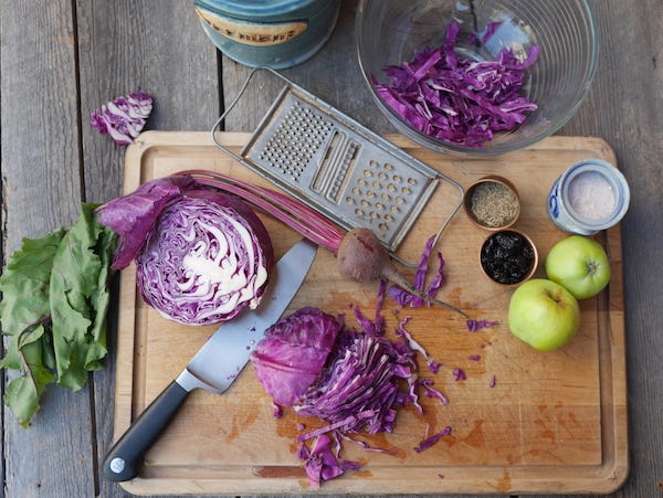 Photo on left has cut red cabbage and other ingredients on cutting board. On the left the finished kraut.