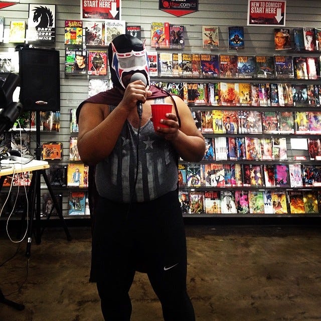 2 images. Left: album cover for El Luchador Negro EP "Don't Touch the Mask." Right: Myself dressed in costume as El Luchador Negro wearing Luchador Mask during performance at a comic shop.