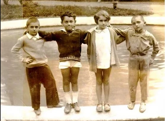 Photo 1: From left to right: Rauf Lakoba, Nikolay Inal-ipa, Ada Schlatter, Nikolai Lakoba. Shortly before repression. Gagra, Abkhazia. Early 1930s. Photo 2: A prison snapshot of Mikhail Lakoba's son Nikolay. Photo 3: Nestor Lakoba's mother Shakhusna Dzhergenia. Photo 4: Sariya (Nestor Lakoba's wife) and their son Rauf Lakoba. Last picture with her son, one year before arrest.