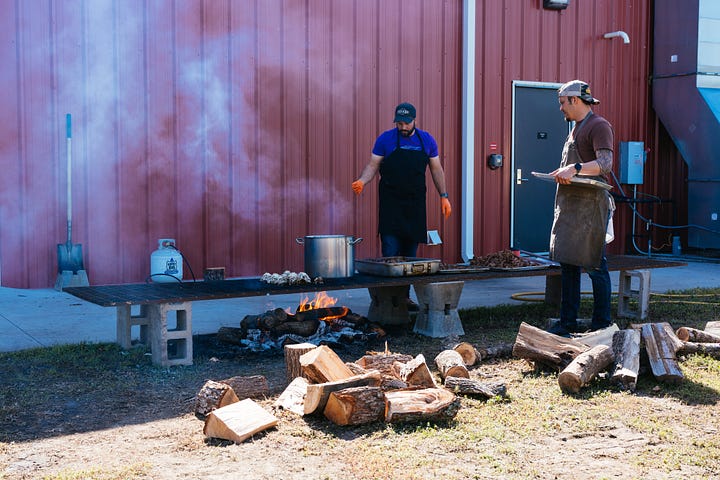 Clockwise from upper left: two men in front of open flame grill; man grilling on open flame; bison steaks on grill; squash on grill