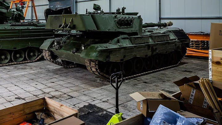 At left, a Leopard 1A5 at Rheinmetall's Ukraine facility. At right, the 44th Mechanized Brigade conducts field repairs on a Leopard 1A5. Via social media