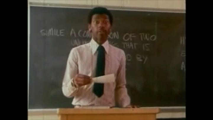 The teacher at the blackboard calling Kevin's name (left), and two girls questioning Kevin's existence (right).