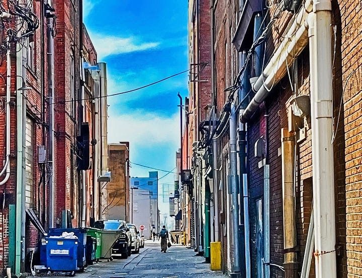 Four photographs of people in colorful groups or in solitary movement in West Virginia.