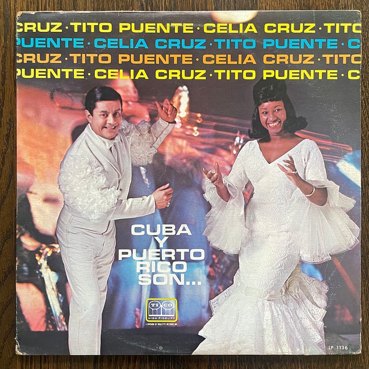 pictures of record album covers of Kraftwerk's The Man Machine, Iron Maiden, Hector Lavoe's Que Sentimeniento, Tito Puente y Celia Cruz, and Maria Freuzas