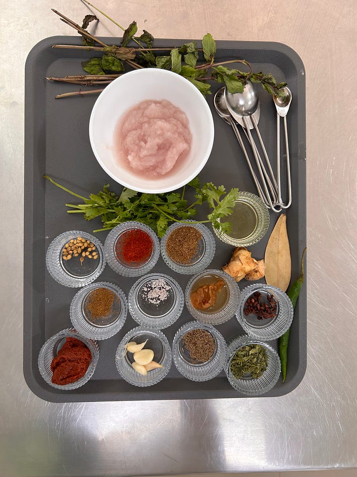 spices and other ingredients in tiny dishes