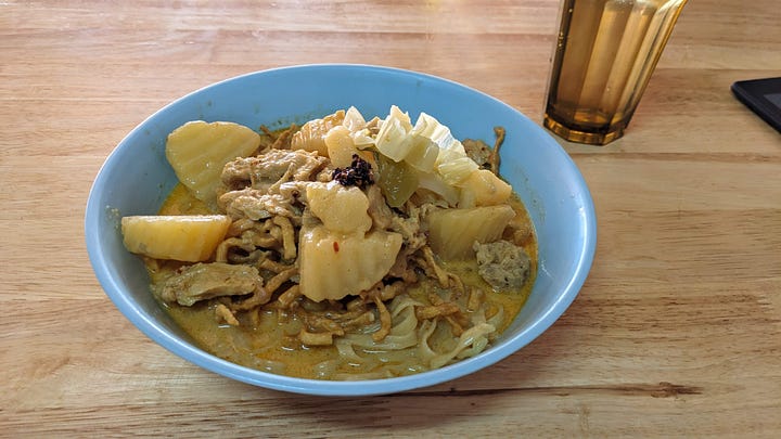 [clockwise from L to R] 1) the cold yet tasty bowl at Ming Kwan - Suthep 2) lovely bowl at Garden to Table, where my sister proclaimed her beef KS the "best yet" 3) Ming Kwan - Old City, a habit 4) my sister's bowl at Khao Soi Manee 2 (I think)