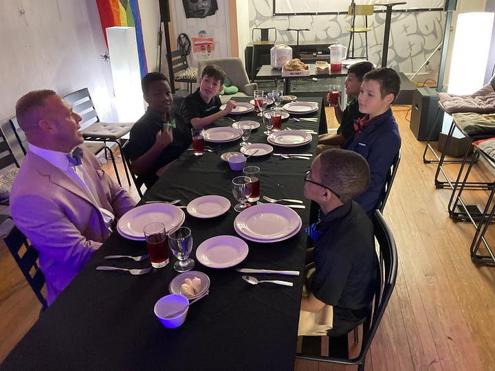 Left: Mohammad Niazi, Lincoln Pretz, and Landon Cascio-McClelland set the table for their lunch at Katora Coffee in downtown Fredericksburg. Right, the Boys in Bowties talk with club leader Tony Wishard, an assistant principal at Hugh Mercer Elementary.