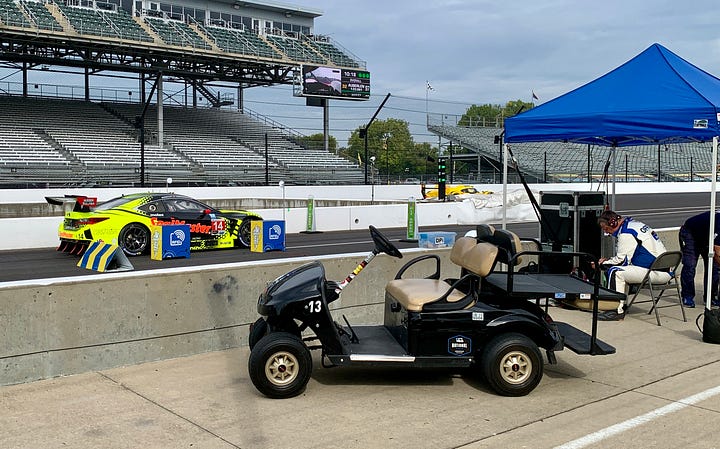 At left, a newly mounted tire for the No. 11 TDS Racing LMP2 team, complete with wheel weight at top left. RIGHT: The No. 14 Vasser-Sullivan Lexus passing through the RFID station at pit road exit.