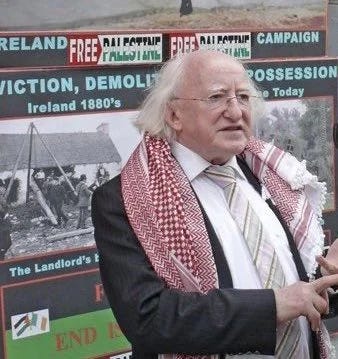 Irish President Michael D. Higgins wears a Keffiyeh while speaking to the press about Israel's apartheid regime.
