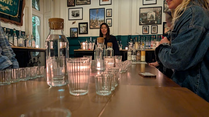 Our wonderful mezcal guide hosting our tasting at Salon de Agavé in Mexico City. A Some more of the many, many bottles she has on offer at tasting events..