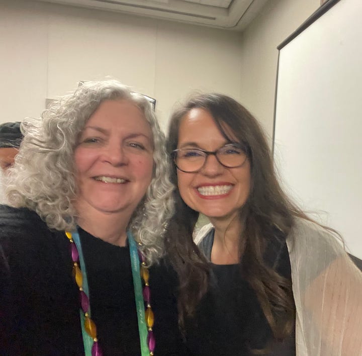 Women gathered to celebrate from the show floor at RootsTech 2025