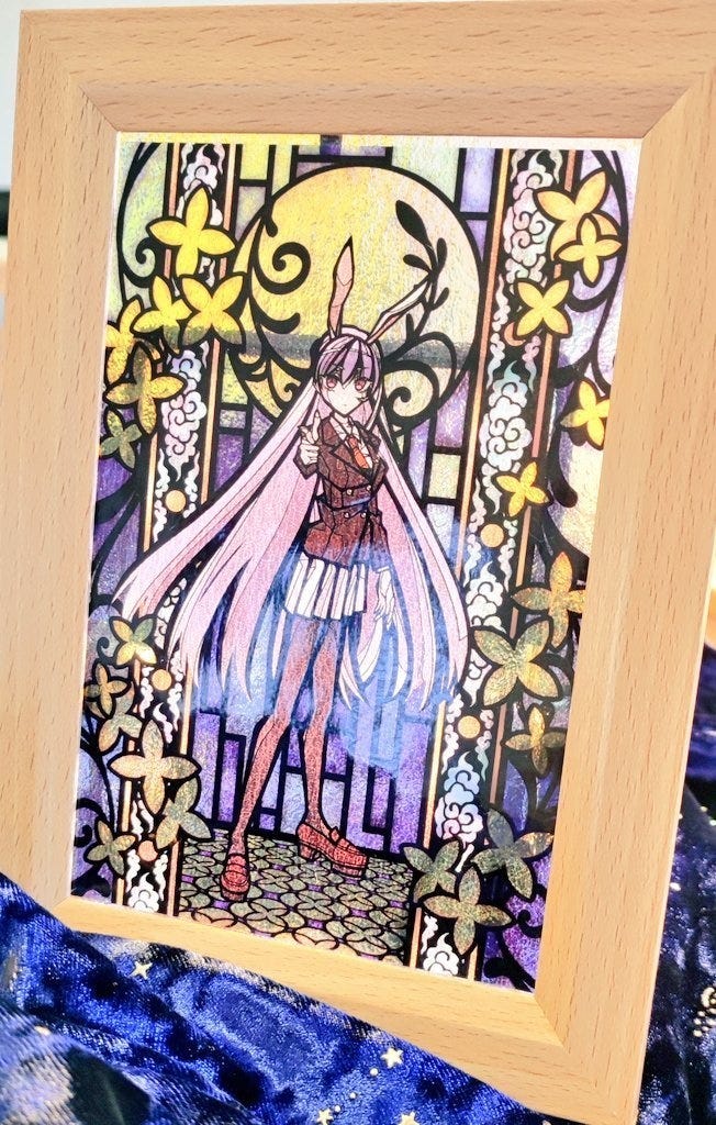 colourful stained glass illustrations of Touhou characters.