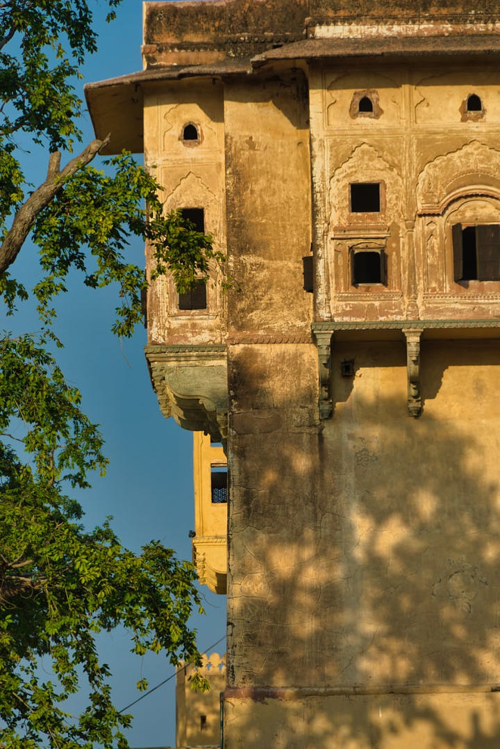 Images of the buildings and ramparts of the Nahargarh Fort in the late afternoon sun.