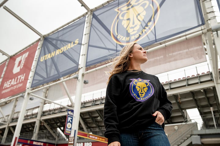 Amy Rodriguez poses for photos at America First Field upon being introduced as the new head coach of the relaunched Utah Royals FC. (Photo: Laura Dearden, Utah Royals FC)