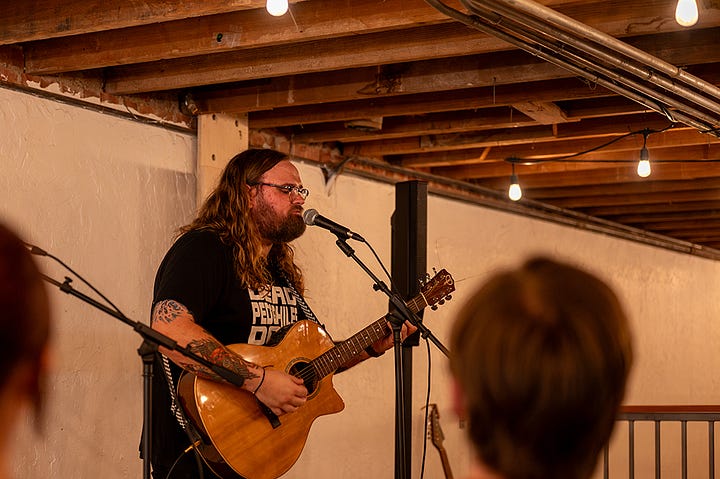 Music from Garry Walden and Tiny Joy in the loft at Iron Society Salon