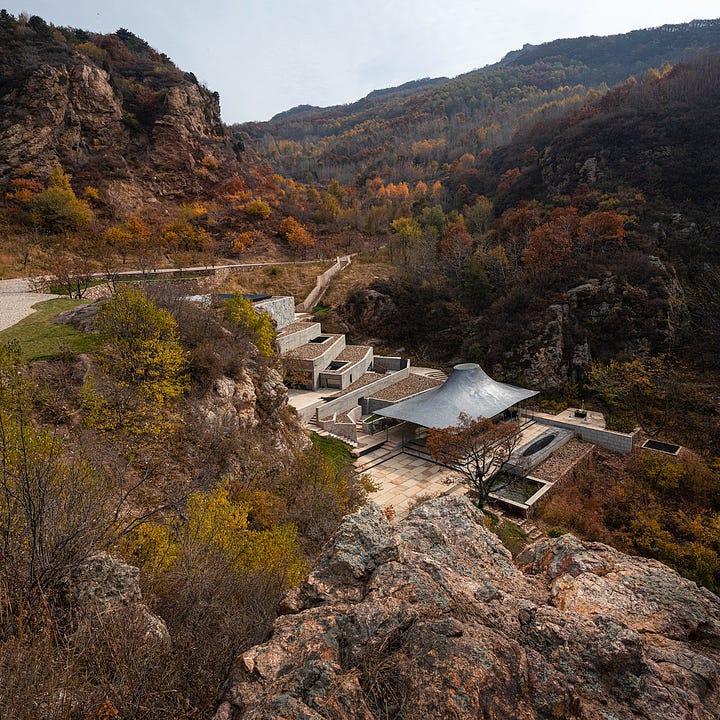 Images of a Chinese Buddhist temple built next to the Great Wall of China by Atelier Deshaus