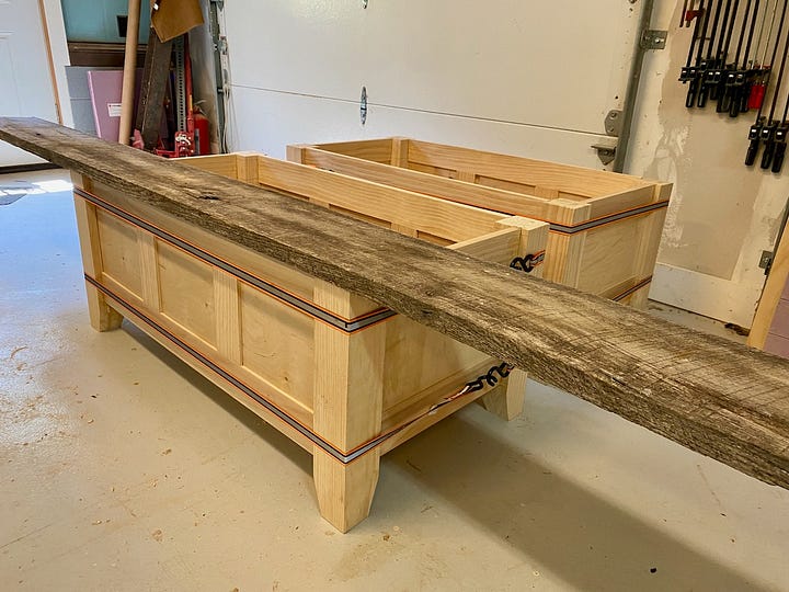 Storage benches clamped while the glue dries, and then painted