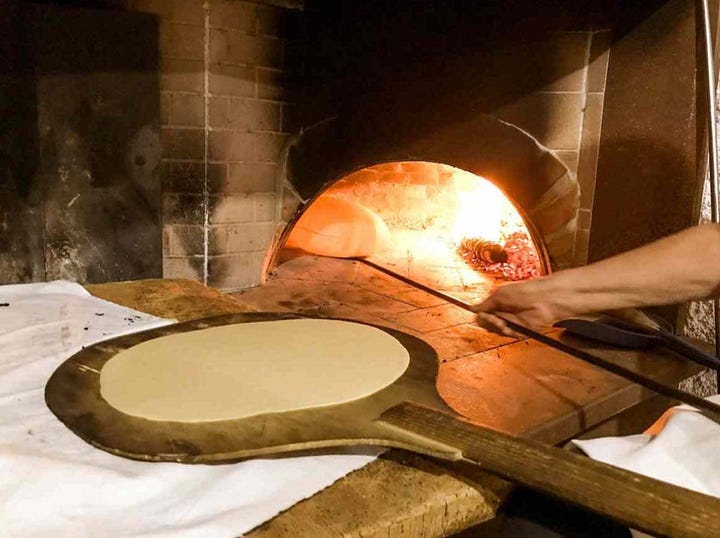 baking pane carasau in wood burning oven