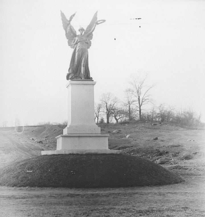 Photographs show the Soldiers' and Sailors' Monument in Jamaica before there were any paved roads or buildings.
