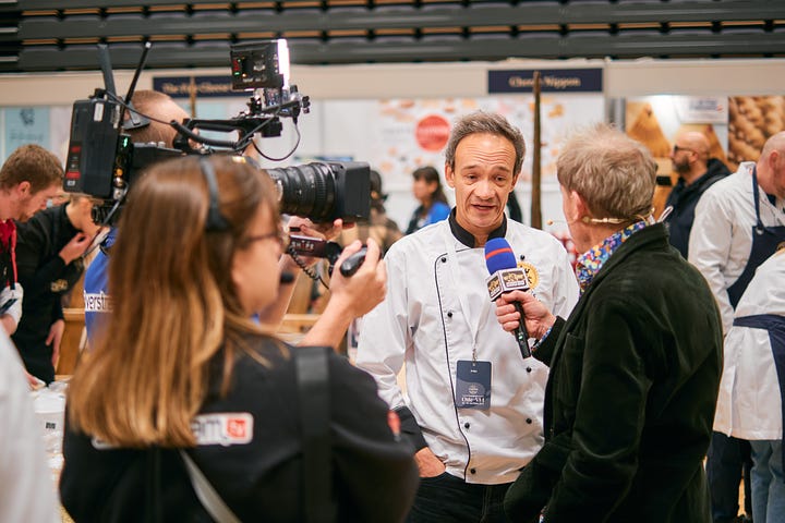 Four images showing food broadcaster Nigel Barden at the World Cheese awards in Trondheim, Norway. He is pictured with cheese makers and award winners