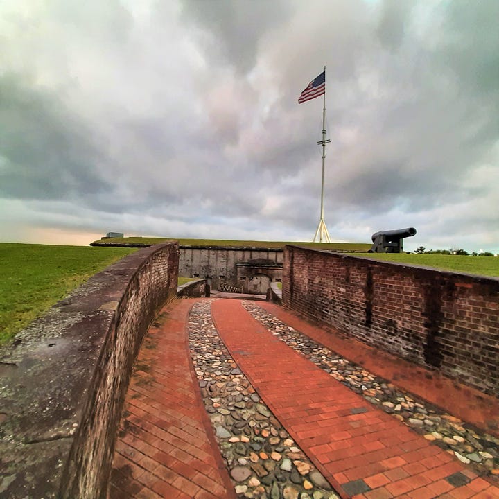 Photos of Fort Macon showing a brick walkway and cannons under a cloudy sky.