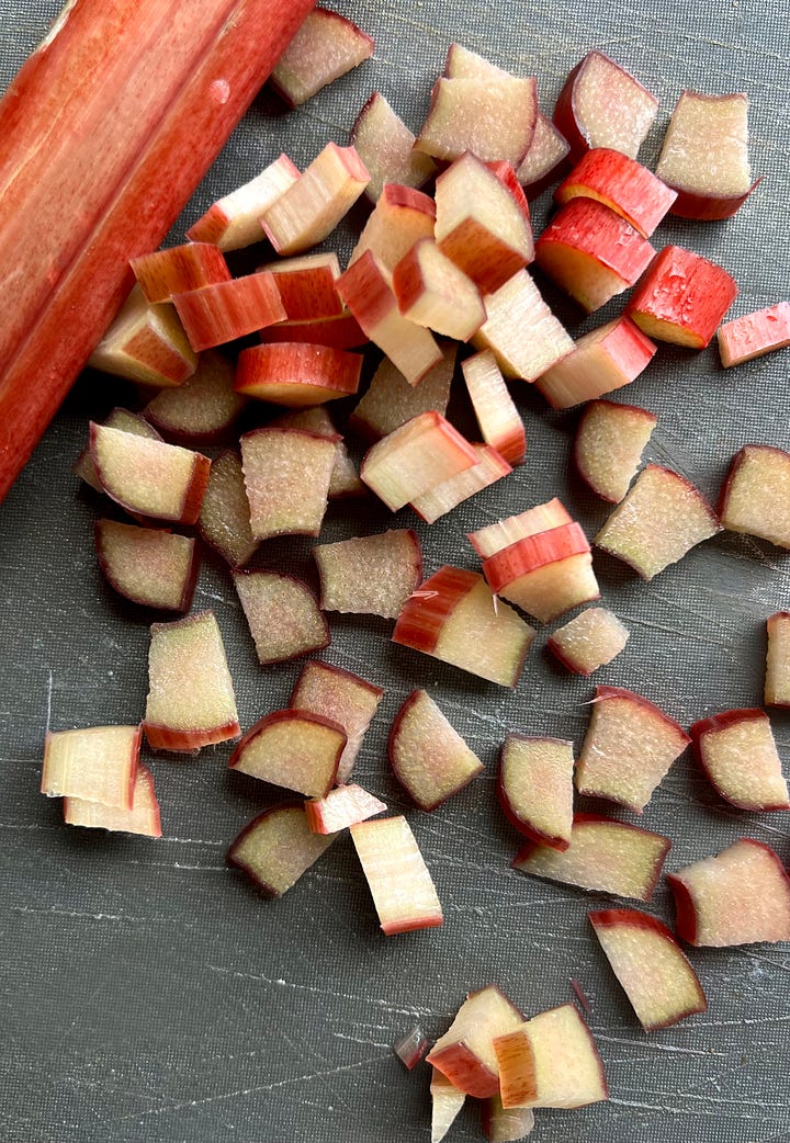 Pistachio meal in a blender and chopped rhubarb.