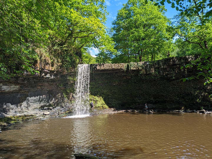 waterfalls in the brecon beacons sunshine