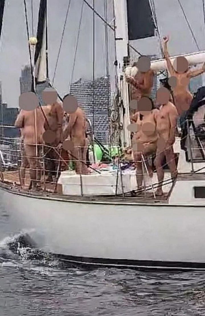 photos depict a boat full of flesh colored bodies that are obscured with excessive censor blurs.