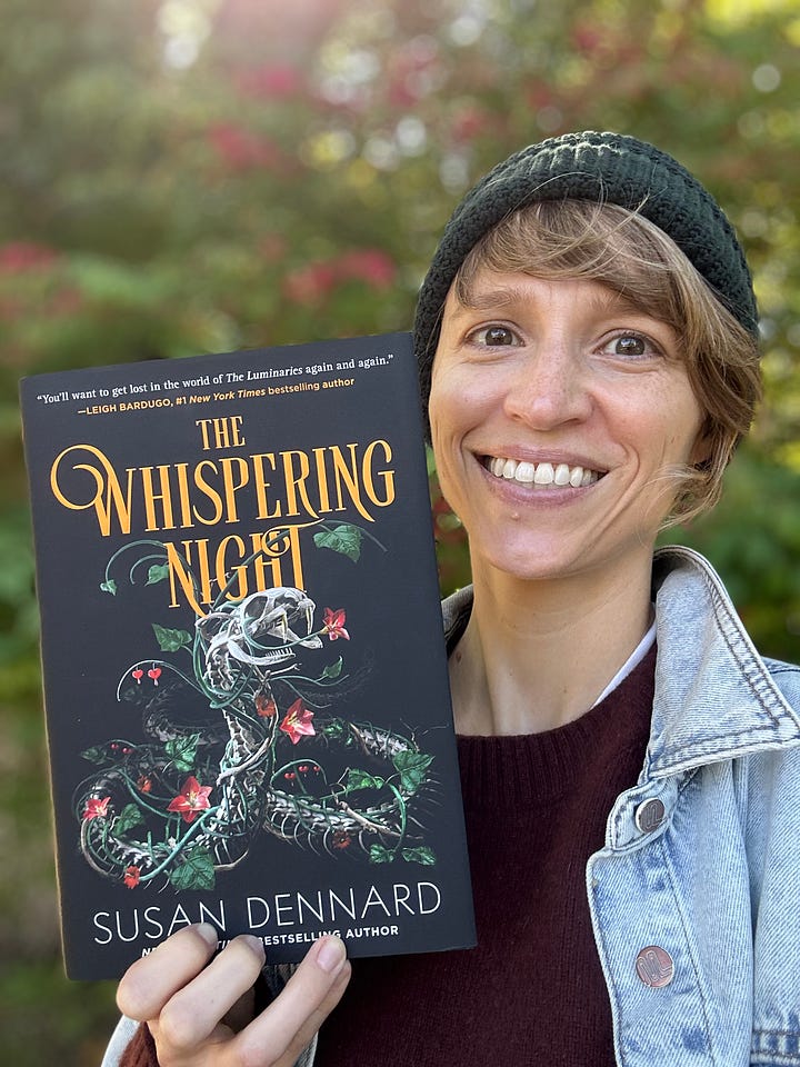 Images of the US edition of The Whispering Night, one showing Susan holding it and smiling. A mother showing it lying on a wooden background. Another showing the hardcover stamp of the Luminaries moon in copper. And a final image of the Whispering Night with beach grass and a green wall behind it.