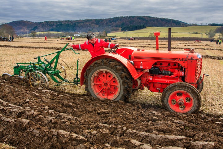 Older forms of cultivation were less carbon intensive: ploughing by a team of two Clydesdale horses and an old-fashioned, low-powered tractor © Felicity Martin
