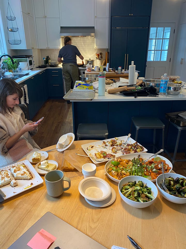 Photo shoot taking place in a kitchen with lots of food on the counter tops.