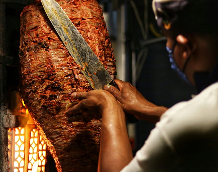 Shaving Al-Pastor from the Trompo, Tacos in Tel-Aviv, Photos by Francisco De Legarreta C. and  Yoad Shejtman, Unsplash