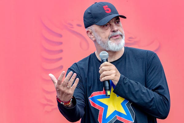 From choreographed crowds to controlled access, these images from Prime Minister Edi Rama’s rally in Kavajë capture the tension between spectacle and surveillance in Albania’s political theatre. (VX Photo/ Vudi Xhymshiti)