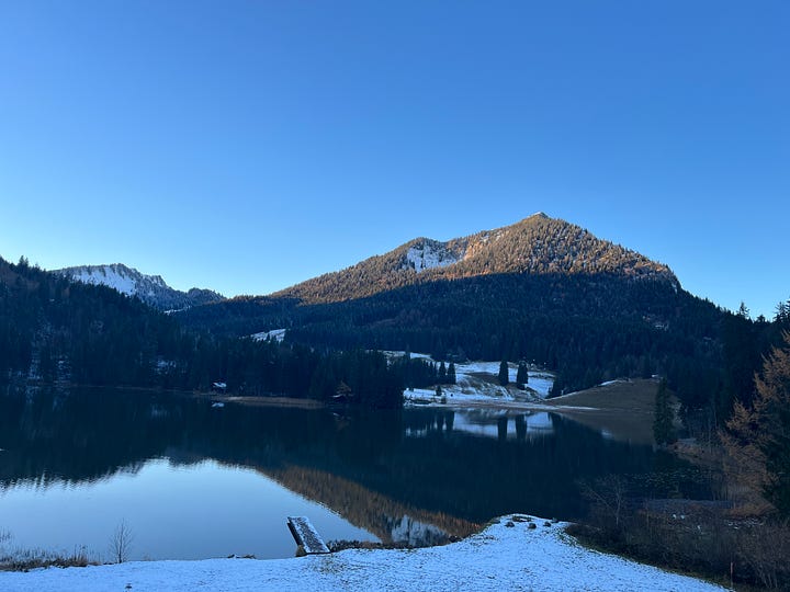 High up in the mountains lake snow