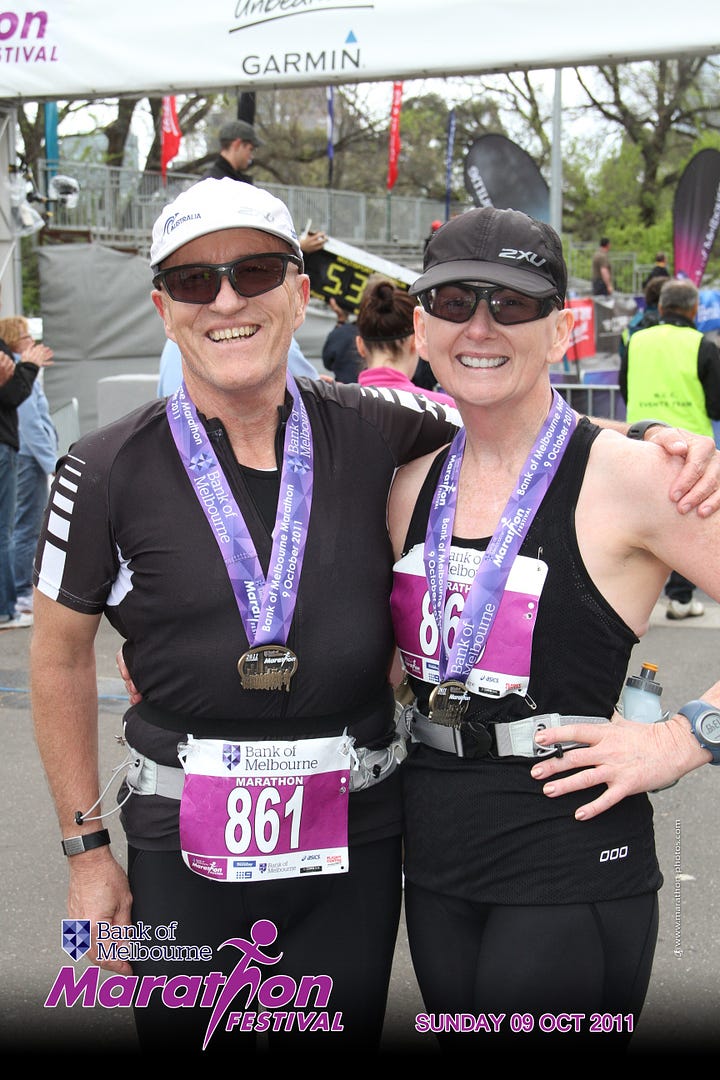 Two photos. Each photo: a man and a woman in running gear, caps, sun glasses, and medals.