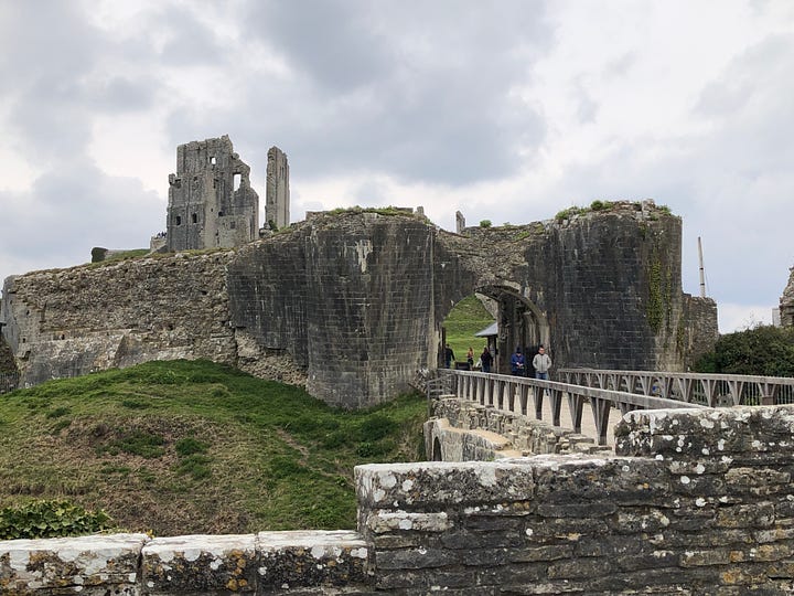 A picture of Corfe Castle Gate as it is today, and an illustration of the betrayal of Edward the Martyr