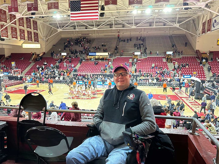 John pictured in front of a bay and inside of the Boston College basketball arena.