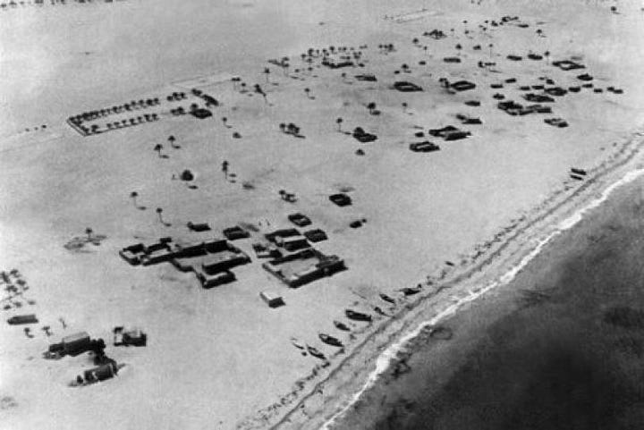 Abu Dhabi village in 60s and modern city of Abu Dhabi