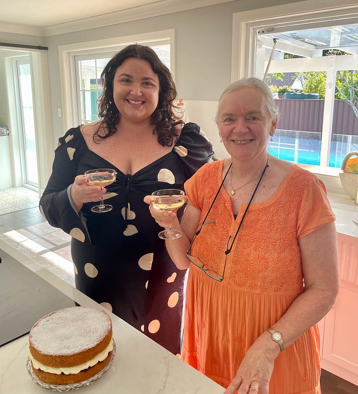 A picture of a sponge cake and me with my daughter-in-law